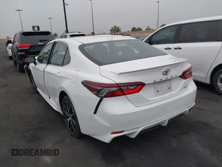 2023 Toyota Camry SE with VIN 4T1G11AK1PU774144, listed as a IAAI auction lot 42153603 with 30,239 mi miles. Bid and sale history available at carsss.com. Image 3.