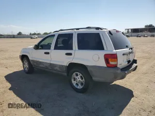 1999 Jeep Grand Cherokee Laredo с VIN 1J4G258S8XC735159, выставлен на аукционе Copart как лот 56247505 с пробегом 241 636 миль миль и Списание • Salvage title. История ставок и продаж доступна на DreamBid. Изображение 2.
