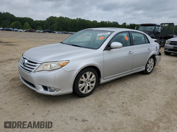 2012 Toyota Avalon z VIN 4T1BK3DBXCU454457, wystawiony jako Copart lot #57153835 z przebiegiem 128 064 mil mil oraz Szkoda całkowita • Salvage title. Historia ofert i sprzedaży dostępna na DreamBid. Obrazek 1.
