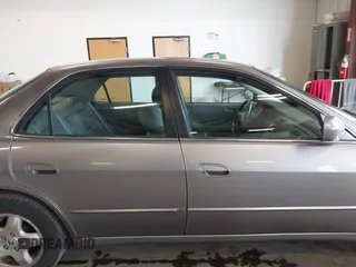 2000 Honda Accord EX z VIN 1HGCG1657YA053433, wystawiony jako IAAI lot #42322643 z przebiegiem 146 517 mil mil oraz . Historia ofert i sprzedaży dostępna na DreamBid. Obrazek 13.