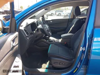 2019 Hyundai Tucson Value with VIN KM8J33A47KU966447, listed as a IAAI auction lot 41631458 with 46,519 mi miles. Bid and sale history available at carsss.com. Image 5.
