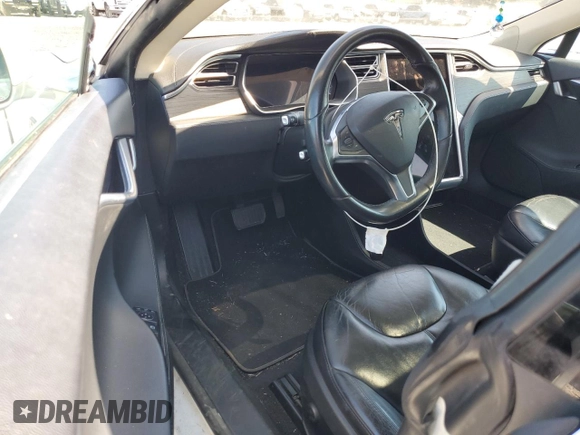 2014 Tesla Model S 60 with VIN 5YJSA1H12EFP51909, listed as a Copart auction lot 55489705 with Not Provided miles and Clean Title. Bid and sale history available at DreamBid. Image 8.