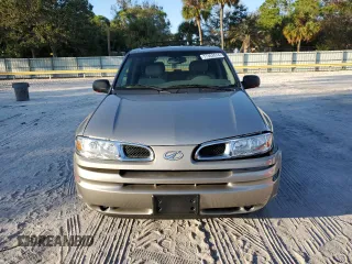 2002 Oldsmobile Bravada z VIN 1GHDT13S022195272, wystawiony jako Copart lot #77302614 z przebiegiem 115 800 mil mil oraz Szkody całkowita. Historia ofert i sprzedaży dostępna na DreamBid. Obrazek 5.