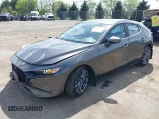 2023 Mazda 3 S Select with VIN JM1BPAKM3P1615785, listed as a IAAI auction lot 42064302 with 63,928 mi miles and . Bid and sale history available at DreamBid. Image 2.
