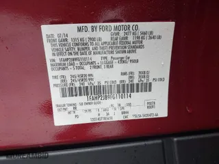 2015 Ford Taurus Limited with VIN 1FAHP2J89FG110114, listed as a IAAI auction lot 41568641 with 153,579 mi miles. Bid and sale history available at carsss.com. Image 9.