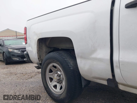 2016 Chevrolet Silverado 1500 Work Truck with VIN 3GCPCNEC5GG256095, listed as a IAAI auction lot 41404492 with 165,184 mi miles and . Bid and sale history available at DreamBid. Image 17.