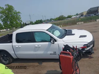 2022 Ram 1500 Rebel with VIN 1C6SRFLT5NN318494, listed as a IAAI auction lot 42413194 with 59,458 mi miles and . Bid and sale history available at DreamBid. Image 13.