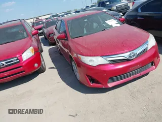 2014 Toyota Camry SE with VIN 4T1BK1FK8EU547143, listed as a IAAI auction lot 41876192 with 209,535 mi miles. Bid and sale history available at carsss.com. Image 1.