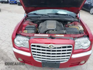 2007 Chrysler 300 C with VIN 2C3KA63H57H684368, listed as a IAAI auction lot 42144972 with 117,478 mi miles. Bid and sale history available at carsss.com. Image 10.