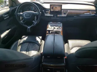 2016 Audi A8 Sport z VIN WAU43AFD7GN005425, wystawiony jako Copart lot #58781405 z przebiegiem 139 435 mil mil oraz Szkoda całkowita • Salvage title. Historia ofert i sprzedaży dostępna na DreamBid. Obrazek 8.