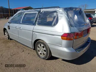 2004 Honda Odyssey EX-L with VIN 5FNRL18924B107971, listed as a IAAI auction lot 41699067 with Not Provided miles and . Bid and sale history available at DreamBid. Image 3.
