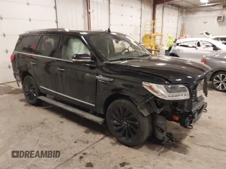 2021 Lincoln Navigator Reserve with VIN 5LMJJ2LT3MEL11572, listed as a IAAI auction lot 41615607 with 94,792 mi miles. Bid and sale history available at carsss.com. Image 1.