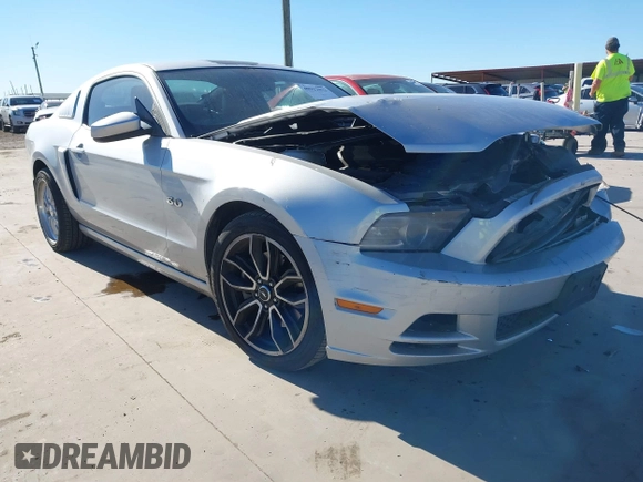 2013 Ford Mustang GT with VIN 1ZVBP8CF5D5232781, listed as a IAAI auction lot 40917812 with 130,447 mi miles. Bid and sale history available at carsss.com. Image 1.