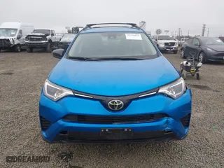 2018 Toyota RAV4 LE with VIN JTMBFREVXJJ739954, listed as a IAAI auction lot 41739873 with 13,726 mi miles. Bid and sale history available at carsss.com. Image 13.