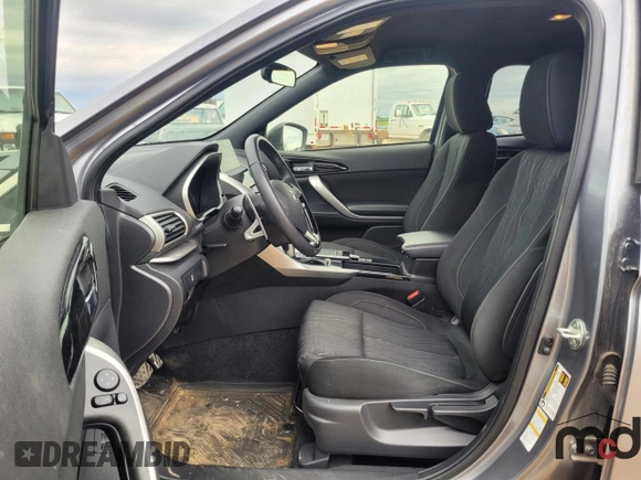 2020 Mitsubishi Eclipse Cross LE z VIN JA4AT4AA3LZ609491, wystawiony jako Copart lot #59165484 z przebiegiem 66 586 mil mil oraz Szkoda całkowita • Salvage title. Historia ofert i sprzedaży dostępna na DreamBid. Obrazek 6.