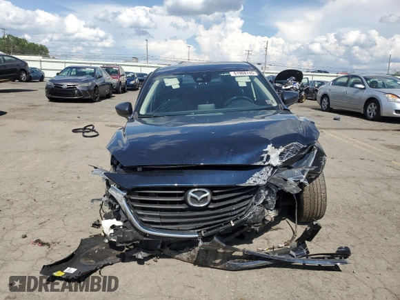 2018 Mazda 3 Touring z VIN 3MZBN1V31JM168860, wystawiony jako Copart lot #61908745 z przebiegiem Nie podano mil oraz Szkoda całkowita • Salvage title. Historia ofert i sprzedaży dostępna na DreamBid. Obrazek 5.