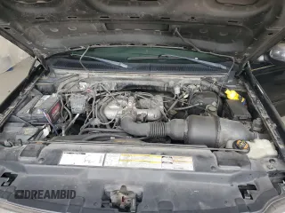 1999 Ford F-150 with VIN 1FTZX1723XNA24144, listed as a Copart auction lot 58071155 with 320,829 mi miles and Salvage title. Bid and sale history available at DreamBid. Image 11.