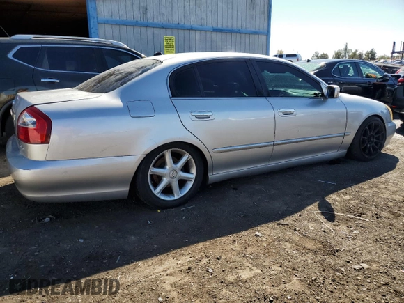 2003 Infiniti Q45 z VIN JNKBF01AX3M103002, wystawiony jako Copart lot #47860175 z przebiegiem 317 912 mil mil oraz Tytuł czysty. Historia ofert i sprzedaży dostępna na DreamBid. Obrazek 3.