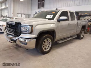 2018 GMC Sierra 1500 SLE with VIN 1GTV2MEC7JZ118876, listed as a IAAI auction lot 41731335 with 157,839 mi miles. Bid and sale history available at carsss.com. Image 2.