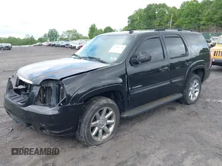 2007 GMC Yukon SLT z VIN 1GKFK13057R336128, wystawiony jako IAAI lot #42301778 z przebiegiem 153 227 mil mil oraz . Historia ofert i sprzedaży dostępna na DreamBid. Obrazek 2.