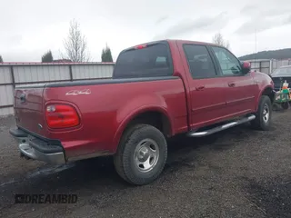 2002 Ford F-150 XLT with VIN 1FTRW08L32KB89593, listed as a IAAI auction lot 41925268 with 178,019 mi miles. Bid and sale history available at carsss.com. Image 4.
