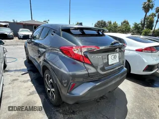 2018 Toyota C-HR XLE with VIN NMTKHMBX1JR004008, listed as a Copart auction lot 61504265 with 106,802 mi miles and Clean title. Bid and sale history available at DreamBid. Image 3.