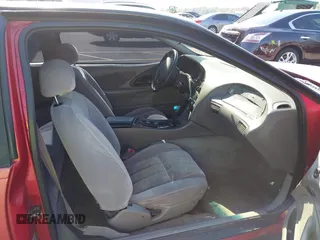 1996 Ford Thunderbird LX with VIN 1FALP62W0TH142986, listed as a IAAI auction lot 42030900 with 168,993 mi miles. Bid and sale history available at carsss.com. Image 5.