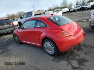 2013 Volkswagen Beetle 2.5L with VIN 3VWJP7AT8DM676584, listed as a Copart auction lot 47134515 with 96,072 mi miles and Salvage Title. Bid and sale history available at DreamBid. Image 2.