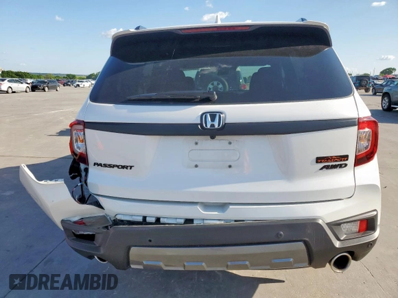 2023 Honda Passport TrailSport with VIN 5FNYF8H64PB007652, listed as a Copart auction lot 54064025 with 22,870 mi miles and Salvage title. Bid and sale history available at DreamBid. Image 6.