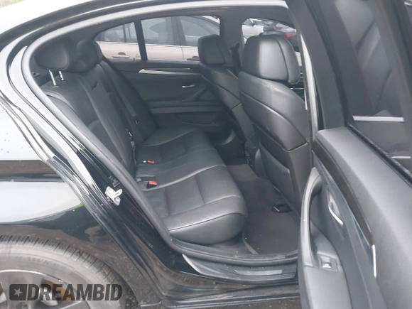 2013 BMW 5 Series 528i with VIN WBAXG5C54DD231297, listed as a IAAI auction lot 41209069 with 79,878 mi miles and . Bid and sale history available at carsss.com. Image 8.