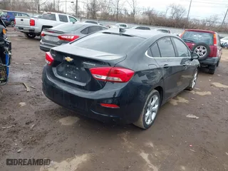 2019 Chevrolet Cruze Premier with VIN 1G1BF5SM9K7101240, listed as a IAAI auction lot 41673049 with 119,025 mi miles. Bid and sale history available at carsss.com. Image 4.