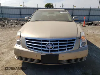 2006 Cadillac DTS 1SD z VIN 1G6KD57Y16U117113, wystawiony jako Copart lot #71485044 z przebiegiem 109 948 mil mil oraz Szkoda całkowita • Salvage title. Historia ofert i sprzedaży dostępna na DreamBid. Obrazek 5.