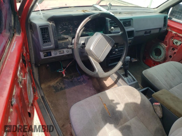1993 Nissan Frontier z VIN 1N6SD16S1PC347211, wystawiony jako Copart lot #68089234 z przebiegiem 298 344 mil mil oraz Czysty tytuł • Clean title. Historia ofert i sprzedaży dostępna na DreamBid. Obrazek 8.