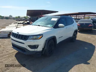 2018 Jeep Compass Latitude with VIN 3C4NJCBB3JT462141, listed as a IAAI auction lot 42024920 with 84,988 mi miles and . Bid and sale history available at DreamBid. Image 17.