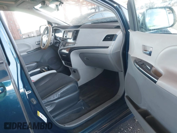 2012 Toyota Sienna SE with VIN 5TDXK3DC0CS264643, listed as a IAAI auction lot 42004082 with 118,675 mi miles. Bid and sale history available at carsss.com. Image 5.