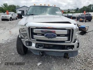 2014 Ford F-250 XL with VIN 1FT7X2B67EEA13796, listed as a Copart auction lot 61712565 with 130,090 mi miles and Salvage title. Bid and sale history available at DreamBid. Image 5.
