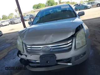 2008 Ford Fusion SEL with VIN 3FAHP08108R247080, listed as a IAAI auction lot 42015038 with 202,843 mi miles. Bid and sale history available at carsss.com. Image 12.