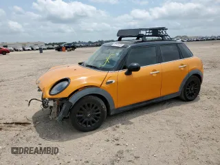 2015 MINI Hardtop 4 Door z VIN WMWXS5C59FT831465, wystawiony jako Copart lot #57534805 z przebiegiem Nie podano mil oraz Tytuł czysty. Historia ofert i sprzedaży dostępna na DreamBid. Obrazek 1.