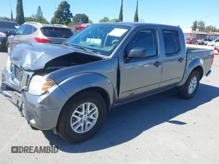 2016 Nissan Frontier S with VIN 1N6AD0ER8GN734203, listed as a IAAI auction lot 41819267 with 67,445 mi miles and . Bid and sale history available at DreamBid. Image 2.