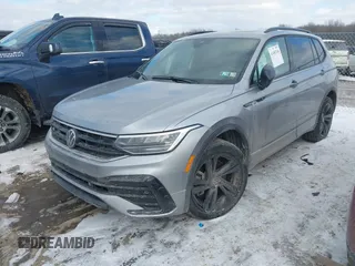 2023 Volkswagen Tiguan SE R-Line Black with VIN 3VV8B7AX3PM106873, listed as a IAAI auction lot 41402146 with 26,701 mi miles and . Bid and sale history available at DreamBid. Image 2.