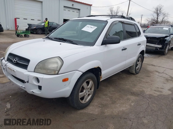2006 Hyundai Tucson GL with VIN KM8JM12BX6U467288, listed as a IAAI auction lot 41679827 with 146,973 mi miles. Bid and sale history available at carsss.com. Image 2.