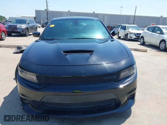 2021 Dodge Charger R/T with VIN 2C3CDXCT4MH684900, listed as a IAAI auction lot 41992358 with 71,386 mi miles and . Bid and sale history available at DreamBid. Image 13.