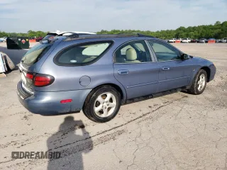 2001 Ford Taurus SE Standard with VIN 1FAHP58S71G184725, listed as a Copart auction lot 56401895 with 163,238 mi miles and Salvage title. Bid and sale history available at DreamBid. Image 3.