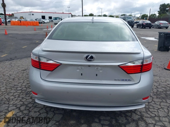 2015 Lexus ES 300h with VIN JTHBW1GG1F2084938, listed as a IAAI auction lot 41761844 with 69,854 mi miles and . Bid and sale history available at DreamBid. Image 16.