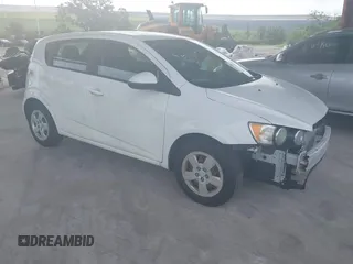 2014 Chevrolet Sonic LS with VIN 1G1JA6SHXE4172519, listed as a IAAI auction lot 42767002 with 71,598 mi miles and . Bid and sale history available at DreamBid. Image 1.