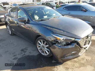2017 Mazda 3 Grand Touring z VIN JM1BN1W31H1104097, wystawiony jako IAAI lot #41494027 z przebiegiem 40 990 mil mil oraz . Historia ofert i sprzedaży dostępna na DreamBid. Obrazek 1.