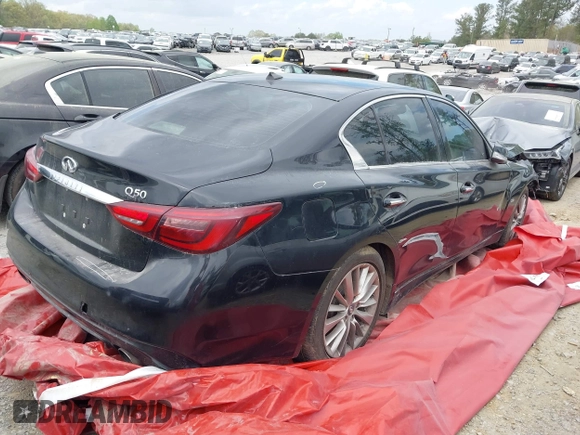 2018 Infiniti Q50 Luxe with VIN JN1EV7APXJM353659, listed as a IAAI auction lot 39289470 with 124,830 mi miles and . Bid and sale history available at DreamBid. Image 4.