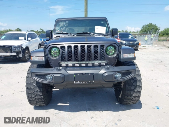 2021 Jeep Gladiator Freedom с VIN 1C6HJTAG2ML512027, выставлен на аукционе IAAI как лот 42333415 с пробегом 60 849 миль миль и . История ставок и продаж доступна на DreamBid. Изображение 12.