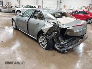 2011 Cadillac CTS Luxury with VIN 1G6DG5EY9B0135220, listed as a IAAI auction lot 42596045 with 158,912 mi miles and . Bid and sale history available at DreamBid. Image 3.