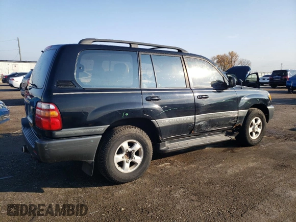 1999 Toyota Land Cruiser with VIN JT3HT05J5X0072564, listed as a Copart auction lot 77000044 with 312,428 mi miles and Salvage Title. Bid and sale history available at carsss.com. Image 3.